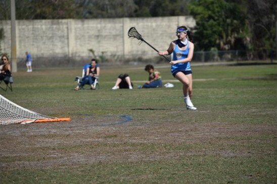 Storm player driving toward the cage